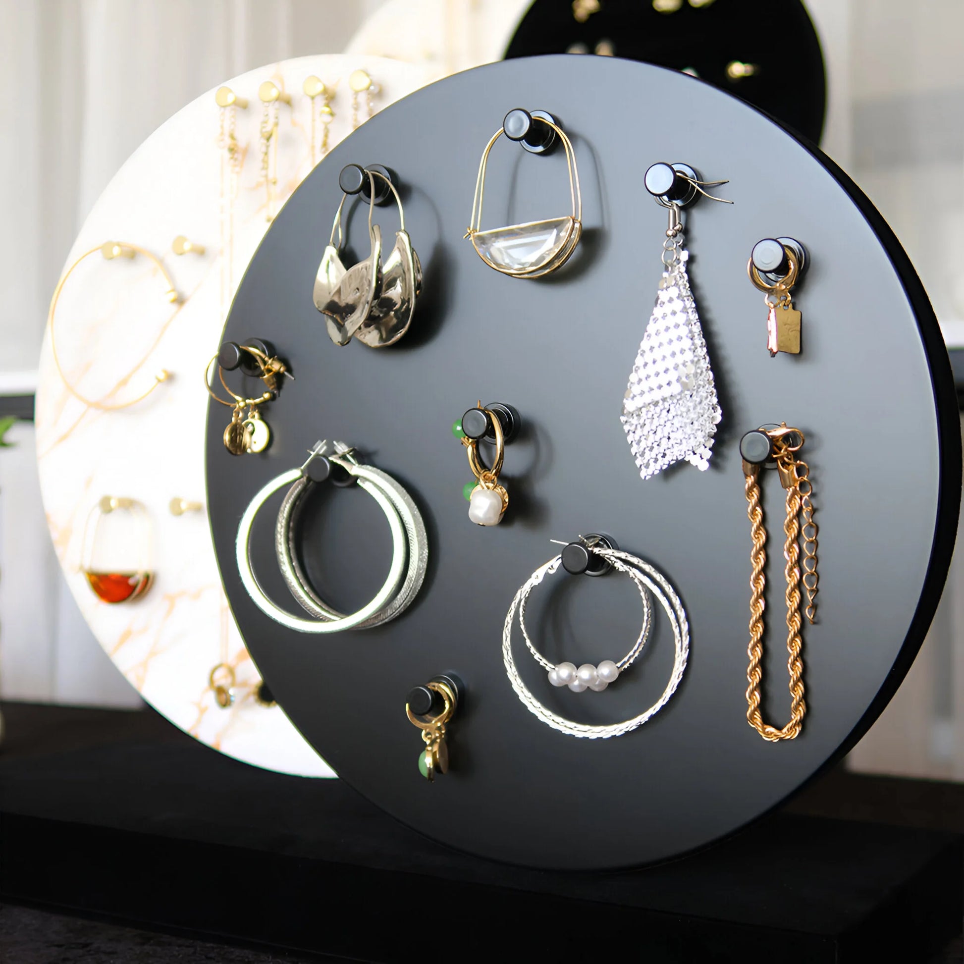 Rotating Earring Stand with Magnetic Earring Holders. Flexible to move around to accommodate different earring designs and sizes.